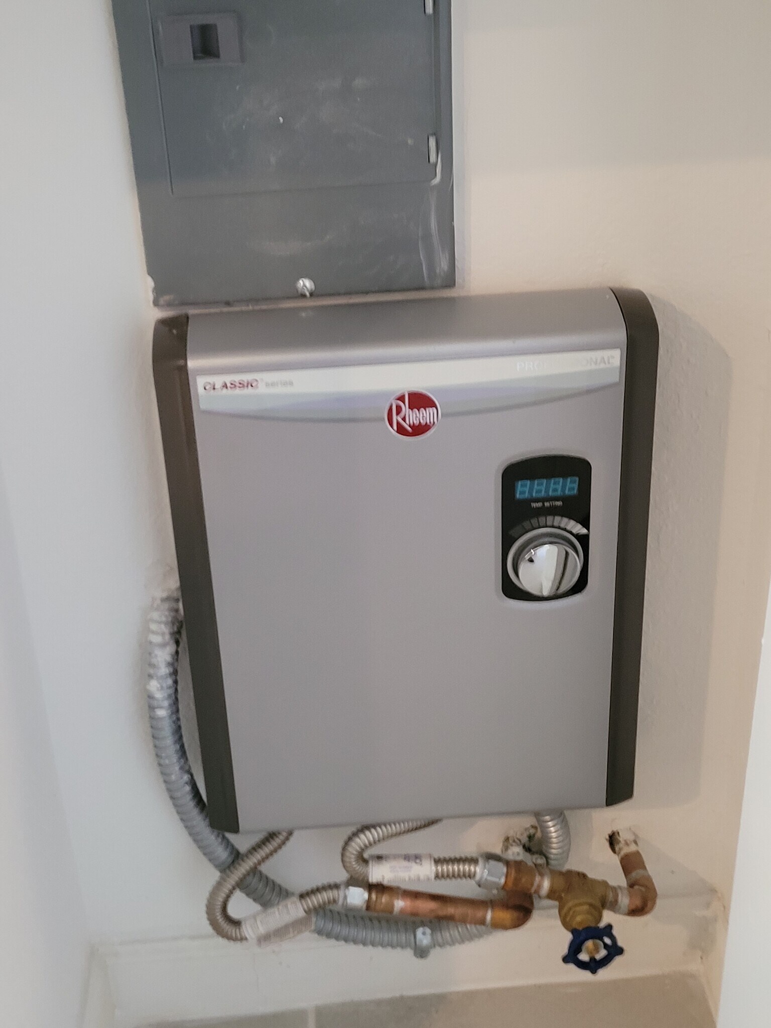 Tankless water heater - 28726 SW 132nd Ct