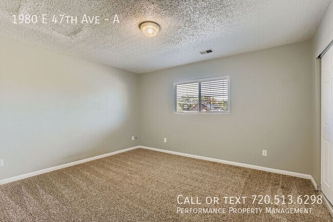 Building Photo - 1980 East 47th Ave.