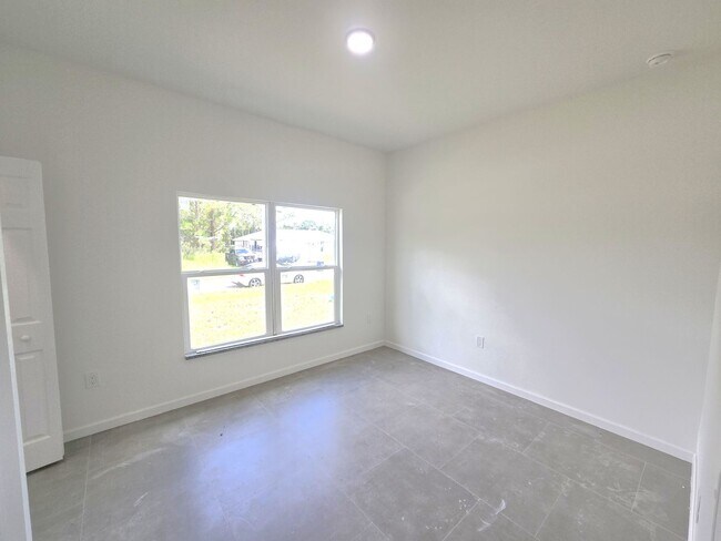 Building Photo - Brand New 2/2/1-South Lehigh Acres