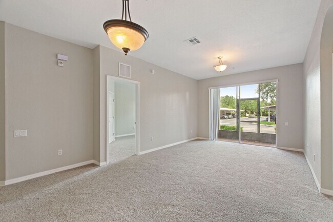Building Photo - First floor condo in Champions Gate! Ready...