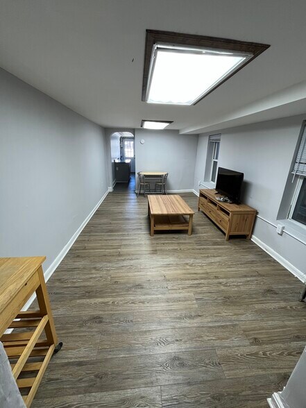 Lower Level Livingroom - 118 S Washington St