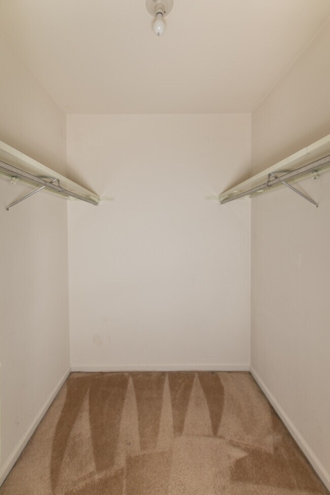 Walk-in closet in bedroom 1 - 8508 Canterbury Sq E