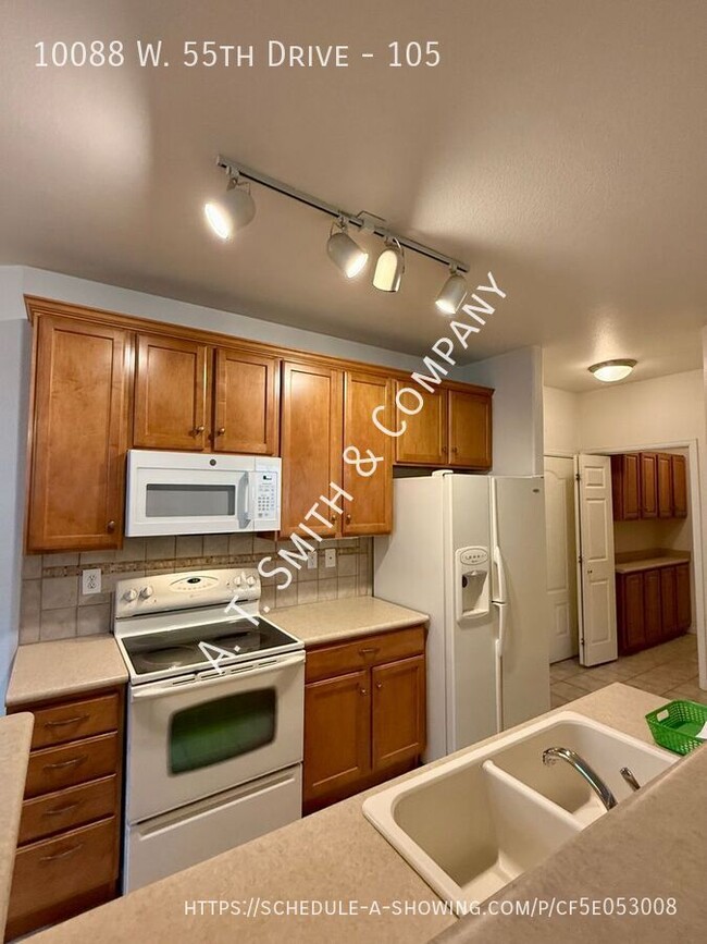 Building Photo - 10088 W 55th Dr