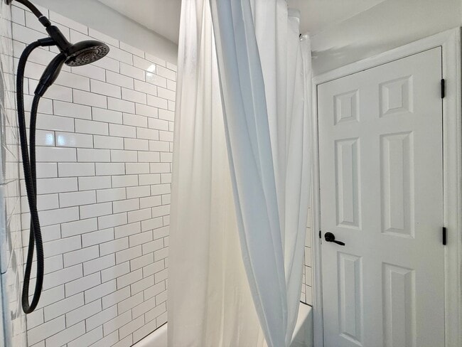 Building Photo - **OFFERING WAIVED APPLICATION FEES** Stunn...