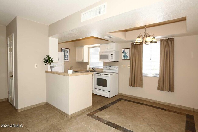 Building Photo - 4554 E Paradise Village Pkwy N