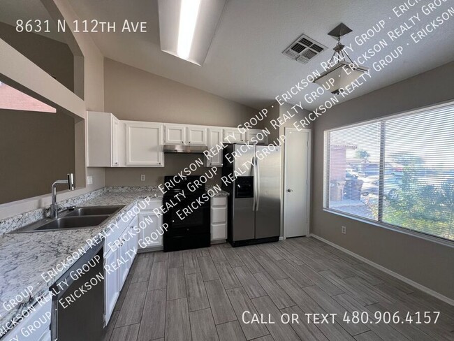 Building Photo - 8631 N 112th Ave