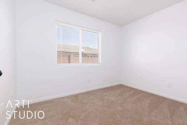 Building Photo - 3-bedroom 2-bathroom townhouse with a 1-ca...