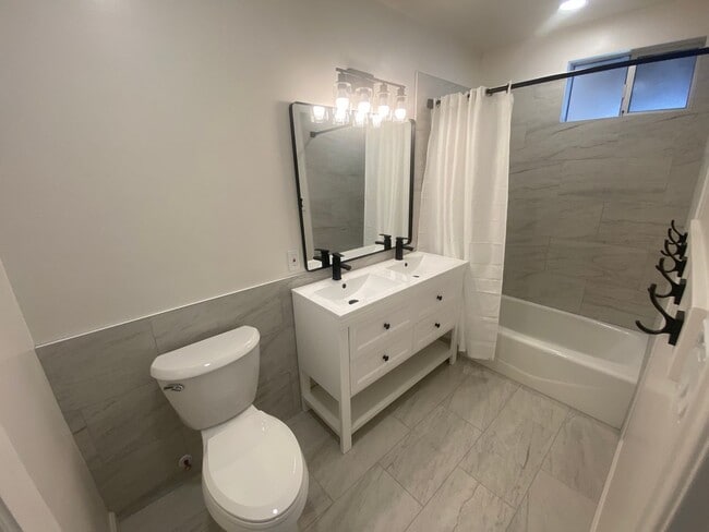 Building Photo - Completely Remodeled 2 Bed, 1 Bath with Garage and Large Yard!