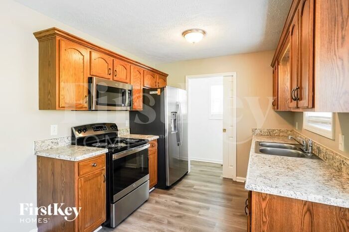 Building Photo - 6009 Pleasant Hill Dr