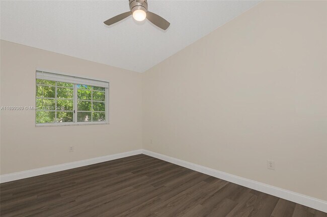 Building Photo - 3211 Sabal Palm Manor