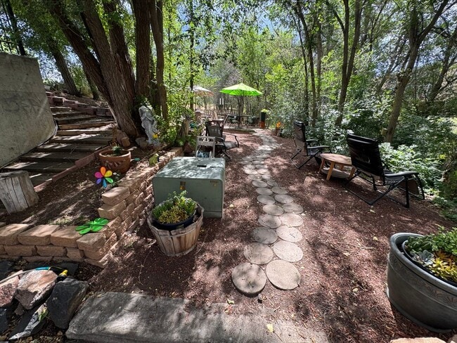 Building Photo - Bright 2BR Townhome with 3 Balconies & Private Patio