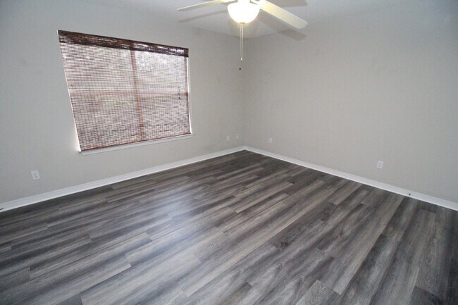 Building Photo - Live the Gulf Breeze Waterfront Life – Dock, Canal Access & Boat Lift!