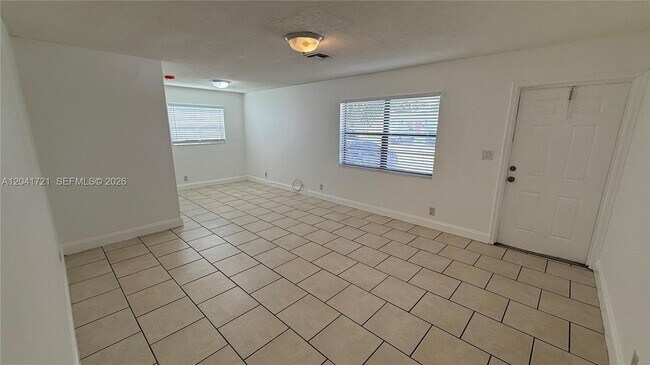 Building Photo - 6421 NW 20th Ct
