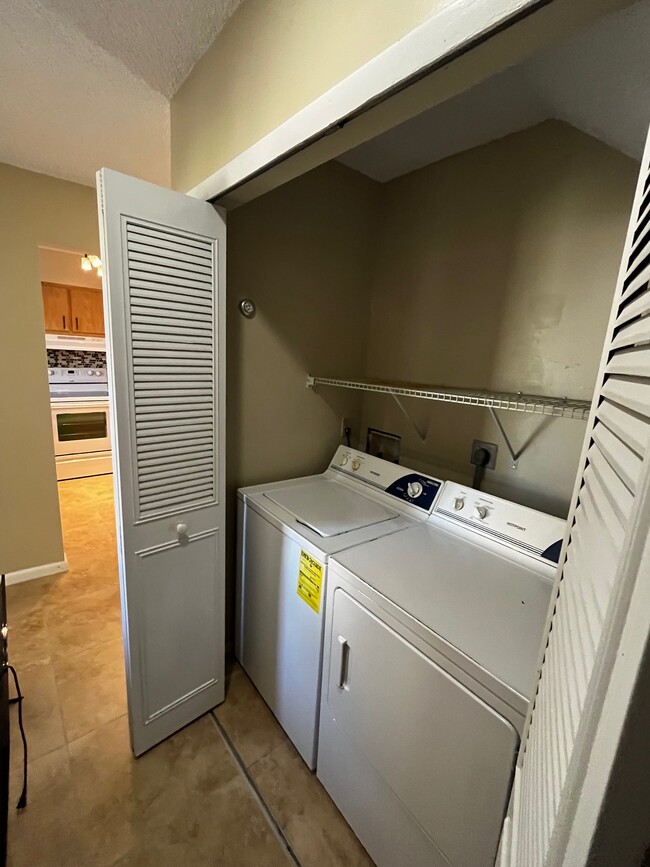 Washer & dryer & extra storage area - 1694 SW Crossing Cir