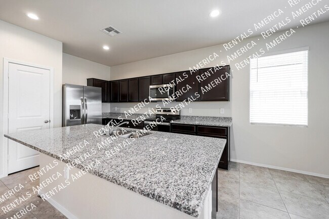 Building Photo - 18436 W Artemisa Ave