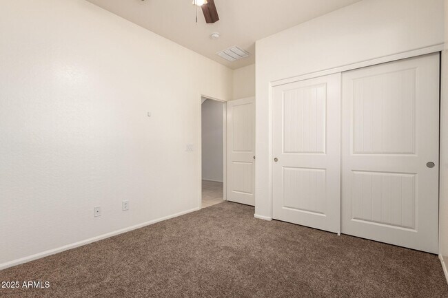 Building Photo - 9883 W Harmony Ln