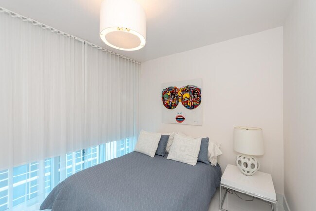 Building Photo - 6899 Collins Ave