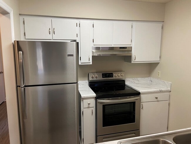 Primary Photo - 720-C Powell Drive ~ 3 bedroom townhome just a short distance from the NC State Fairgrounds