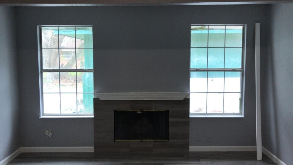 Fireplace in living room - 10335 Glenkirk Dr