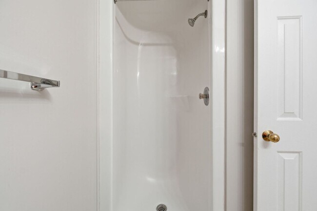 Building Photo - Contemporary design meets exceptional space in this inviting ground level residence, offering eff...