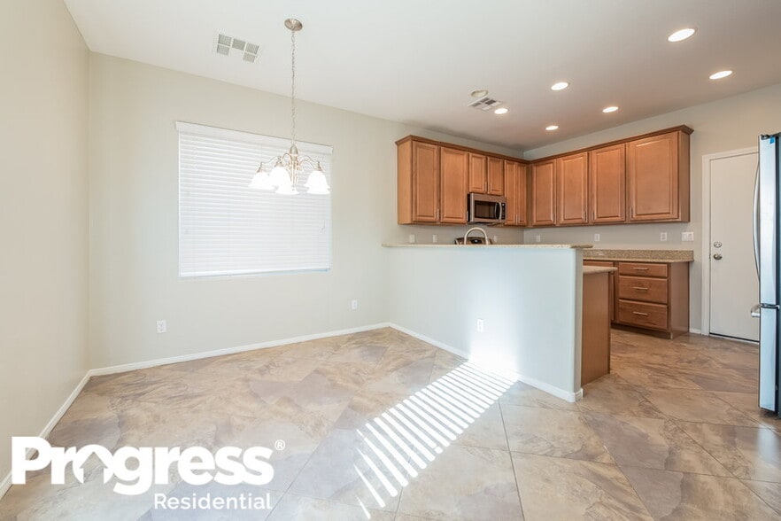 Building Photo - 9333 Flowering Tulip Ave