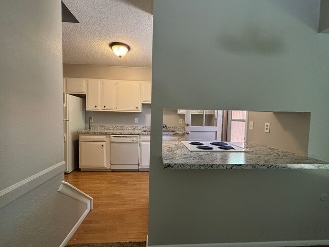 Building Photo - 2-story townhome with 1-car attached garage!