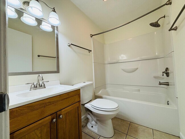 Building Photo - * RE-RENTAL AVAILABLE 8/14/26 * 4 Bedroom, 2 Bath Apartment