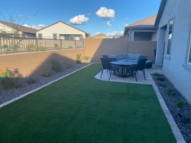 Backyard with firepit - 8916 W Solano Dr