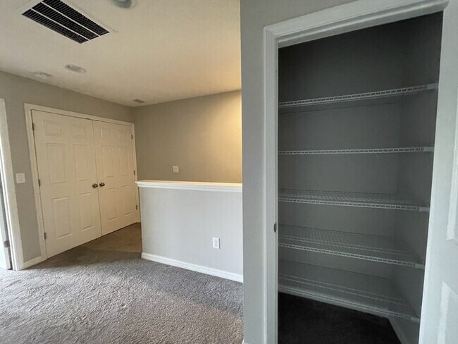 Building Photo - Coming Soon! Spacious 3/2.5 Townhome with ...