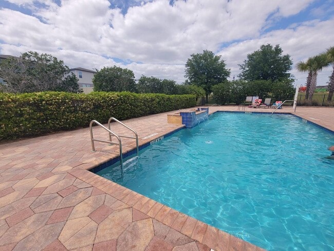 Building Photo - 4/3.5 TOWNHOME VILLA in Waterstone-Davenport