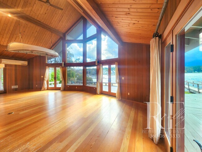 Building Photo - Waterfront Living in Indianola – Dock, Bea...