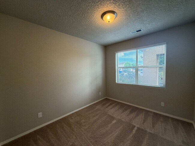 Building Photo - 4 Bedroom Single Story Home Available Near Paseo Del Norte Blvd NE & Rainbow Blvd NW!