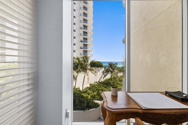 Building Photo - 18671 Collins Ave
