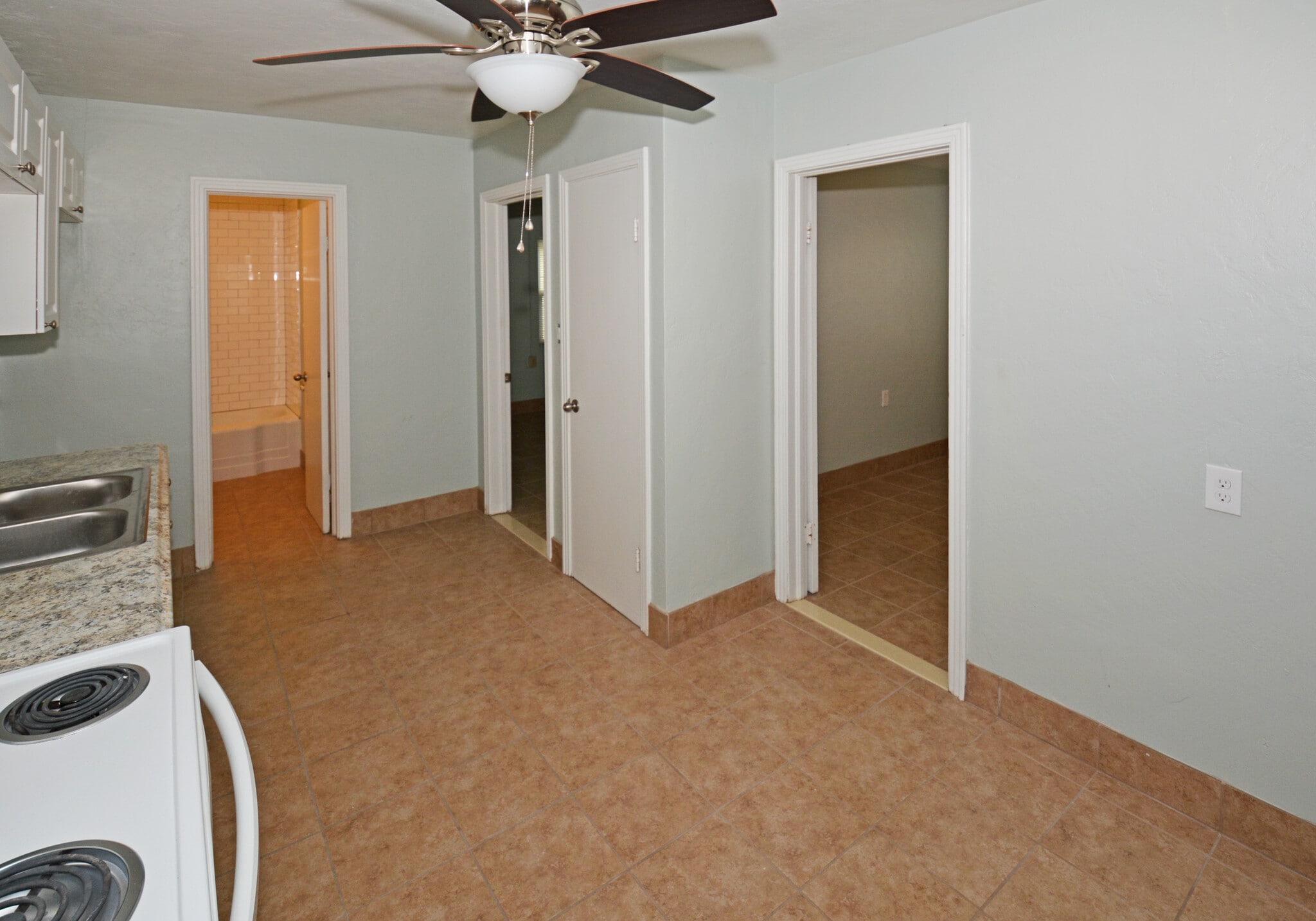 Taken from Kitchen with bathroom entry (left) and two bedrooms (right) - 5009 TANGERINE AVE S