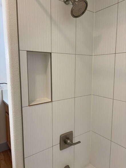 New shower surround tile - 1833 N Williams St