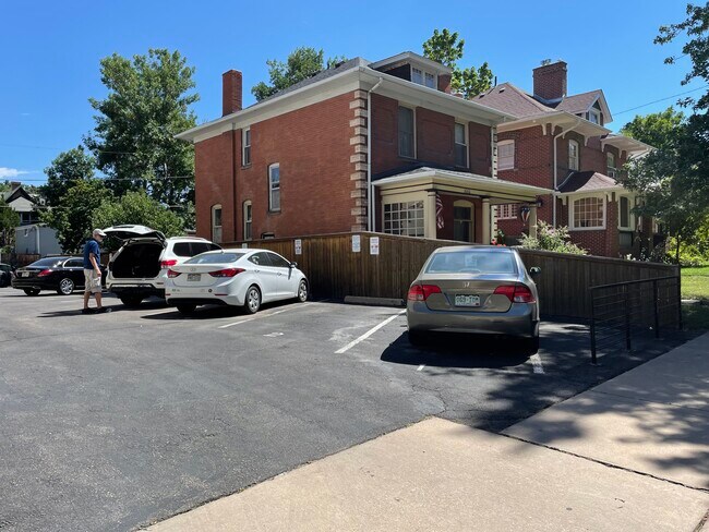 parking #4 and neighbor to south - 1660 Steele St