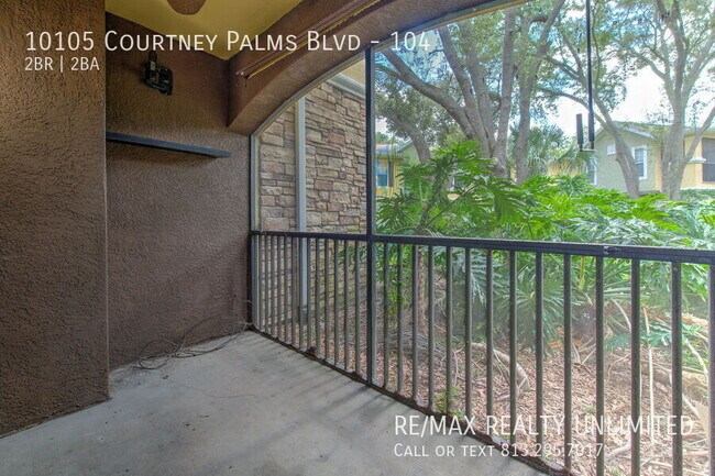 Building Photo - 10105 Courtney Palms Blvd