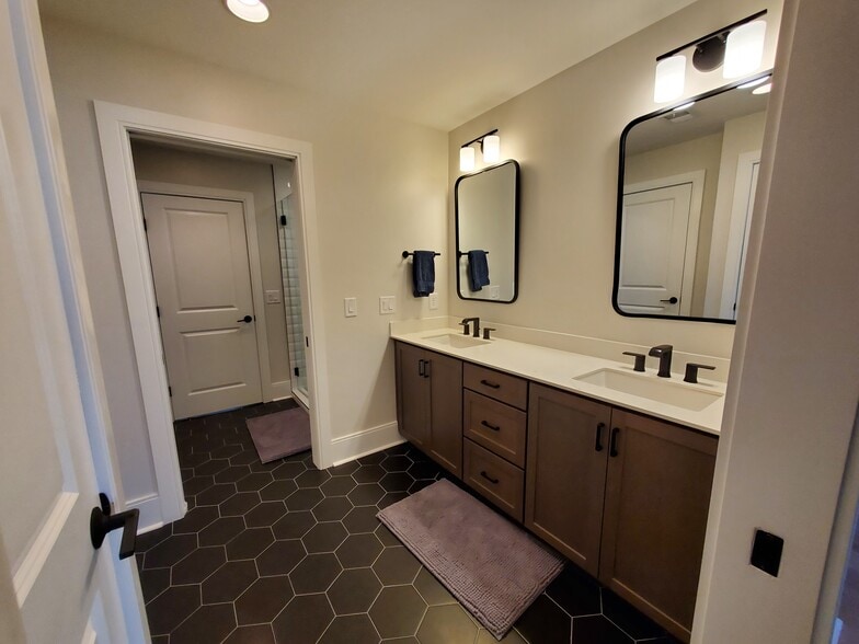 Bathroom #2 has separated shower, vanity, and toilet, providing privacy for multiple guests. - 1021 Cheatham Pl
