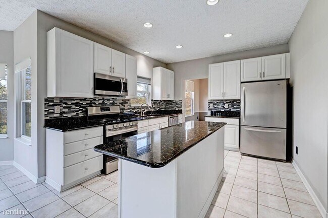 Building Photo - 4 br, 4 bath House - 6704 Wisteria Cir