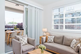 Living Room + Balcony - Flamingo Apartments