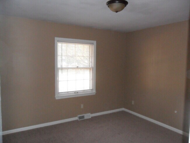 Building Photo - COMING SOON! Spacious Home w/ Finished Basement, Fenced Backyard & Garage!