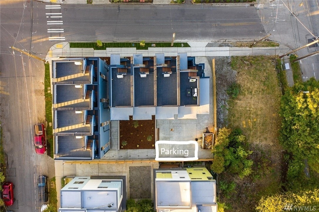 In between buildings there is a bike rack as well - 2609 S Judkins St