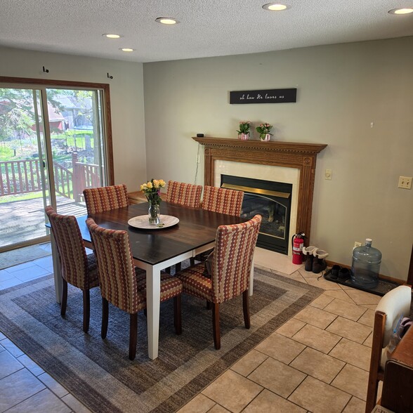 living room/sitting area off kitchen. Patio door to deck. - 2248 139th Ave NW