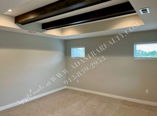 Building Photo - Spacious 4-Bedroom Townhome with Finished Basement in Blue Valley School District-Available NOW!!