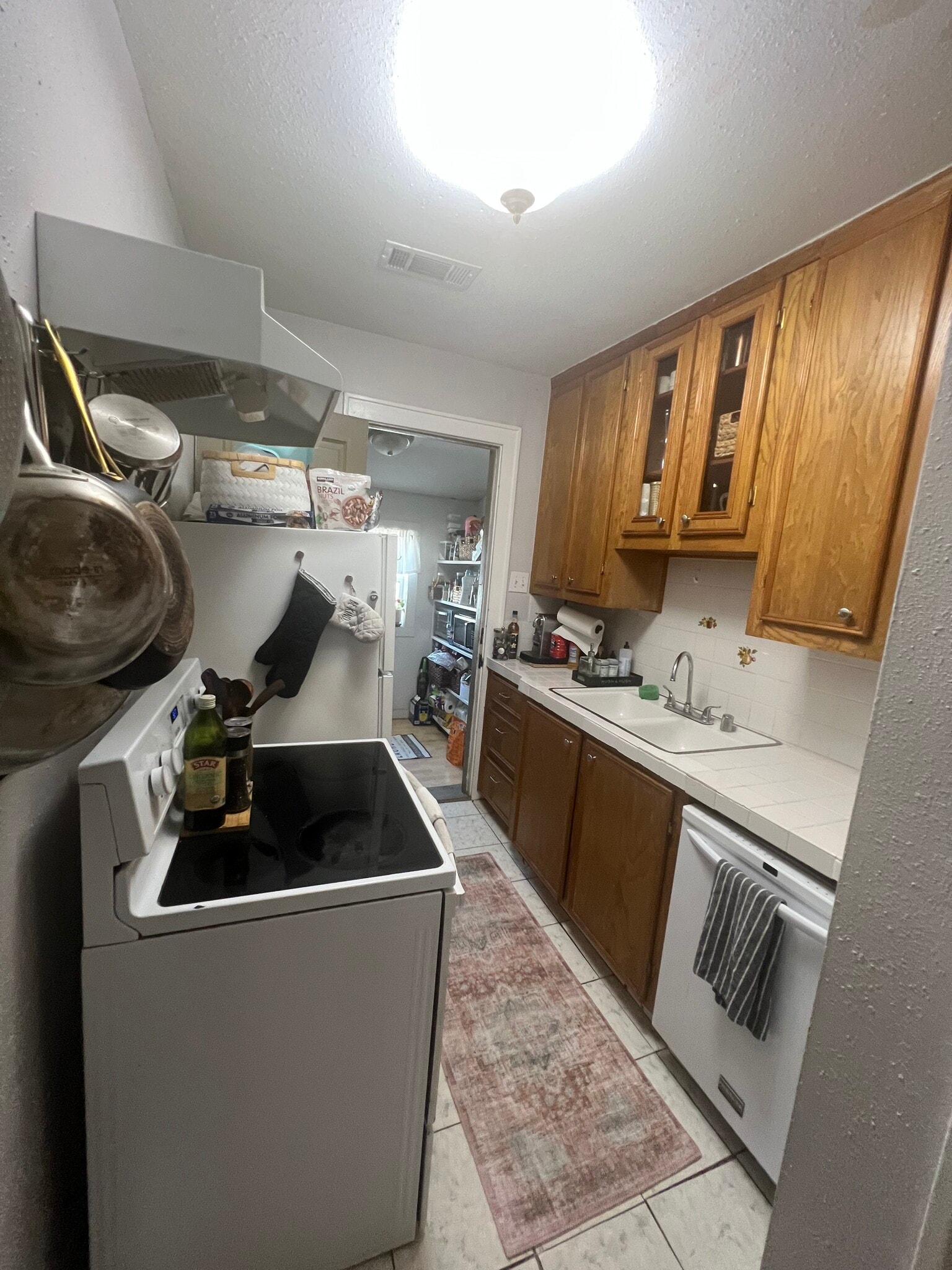 Full sized appliances including dishwasher found in the kitchens - 1220 Waugh Dr