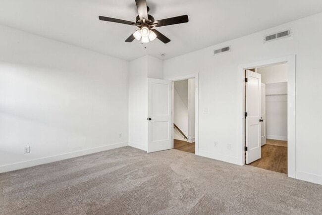 Building Photo - High-End 2BR Townhome | Rooftop Terrace + 2-Car Garage | 24-Unit Commnity
