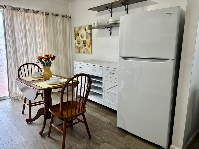 Dining area and full size fridge - 2840 Hollymead Dr