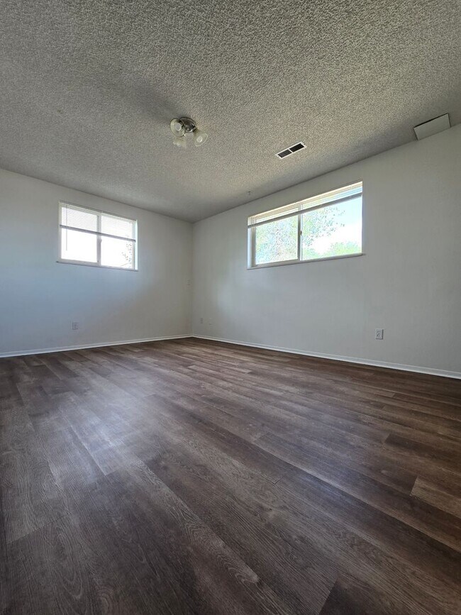 Building Photo - Price Drop! Duplex in Country setting! New paint and Flooring!