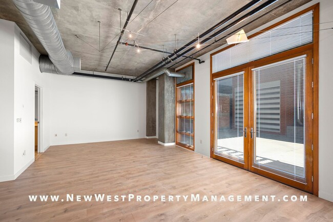 Building Photo - Expansive East Village loft at Parkloft, a...
