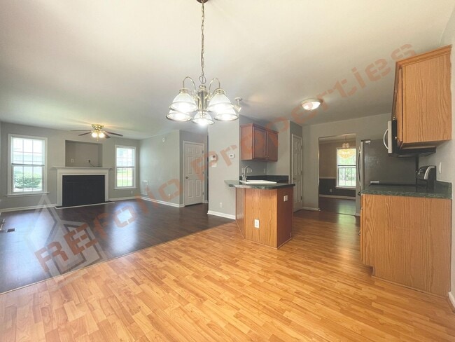 Building Photo - Beautiful 3 Bedroom 2 Car-Garage Home w/ H...